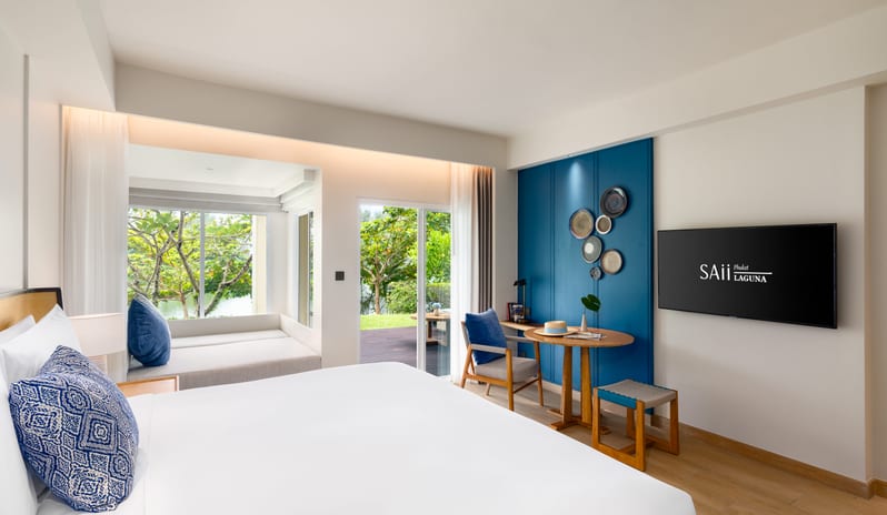 SAii Laguna Phuket Lagoon View Terrace King Bed Bed Table View